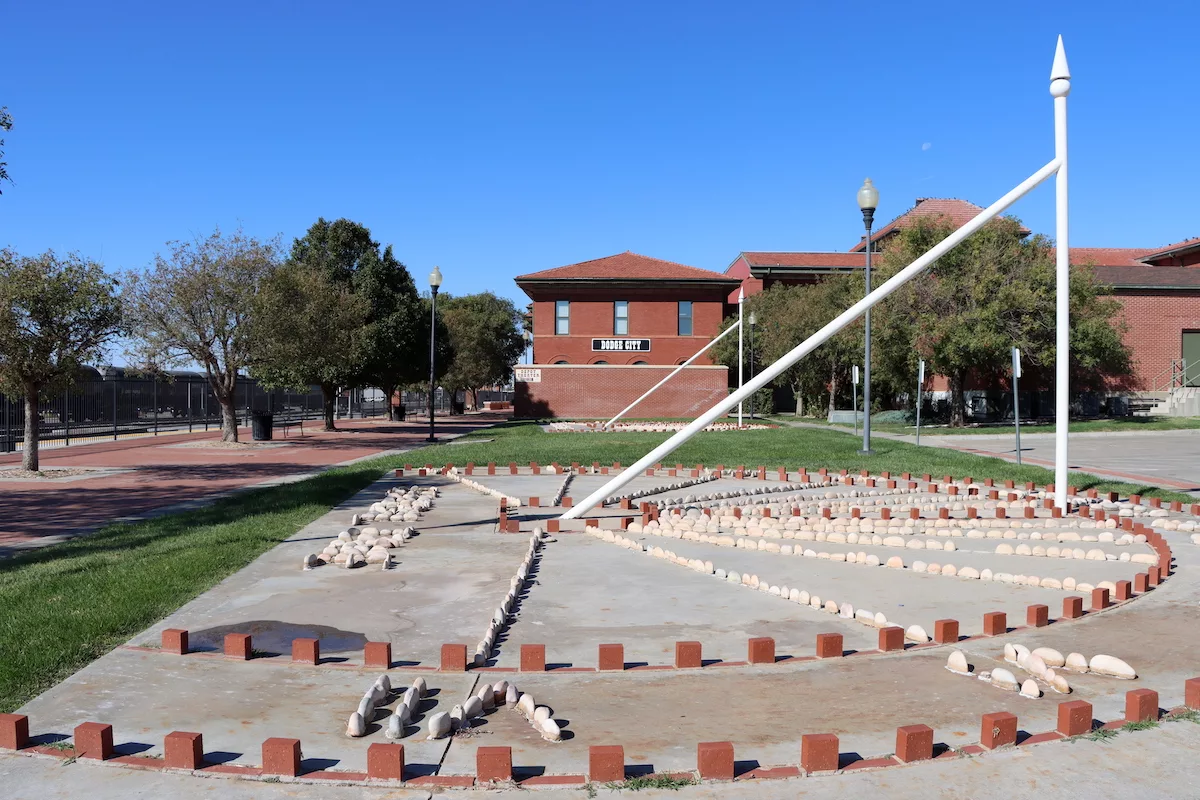 Sun dial sculpture outside of Historic Santa Fe Depot in Dodge City, Kansas