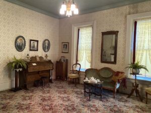 Historically decorated sitting room in the Mueller-Schmidt House - Home of Stone in Dodge City, Kansas