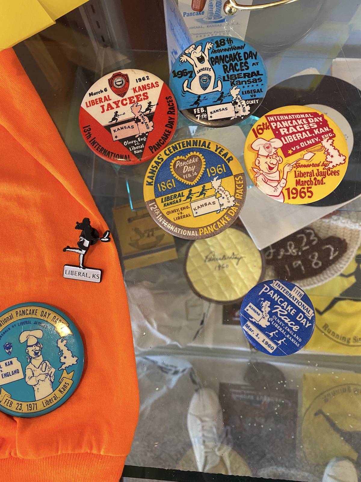 Promotional buttons and memorabilia from International Pancake Day at the International Pancake Day Hall of Fame in Liberal, Kansas