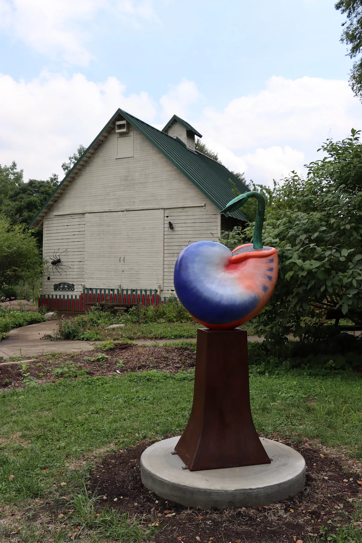 Sculpture in front of barn at Meadowbrook Park in Urbana, Illinois