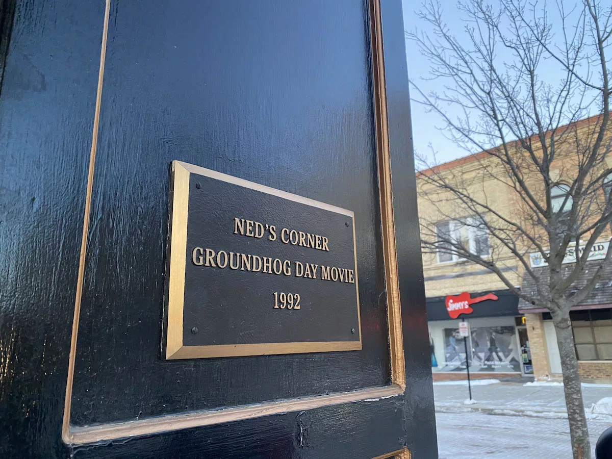 Plaque marking Ned's Corner from the film Groundhog Day, which was filmed in Woodstock, Illinois