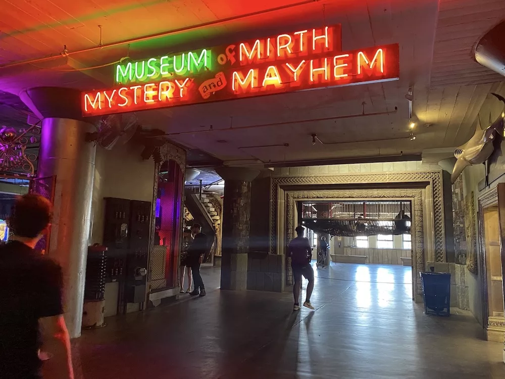 Neon sign for the Museum of Mirth, Mystery & Mayhem at City Museum in St. Louis, Missouri