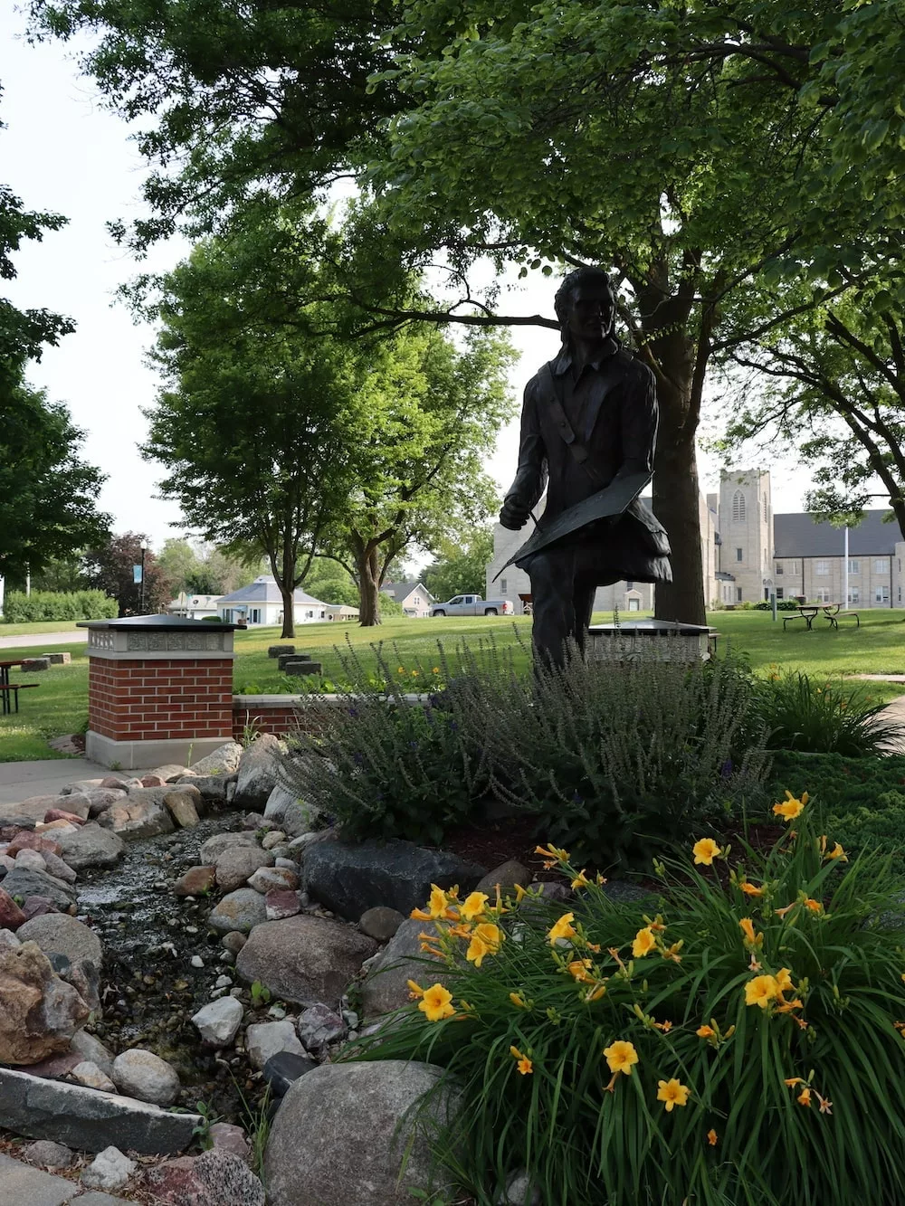 Statue of John James Audubon in park in Audubon, Iowa