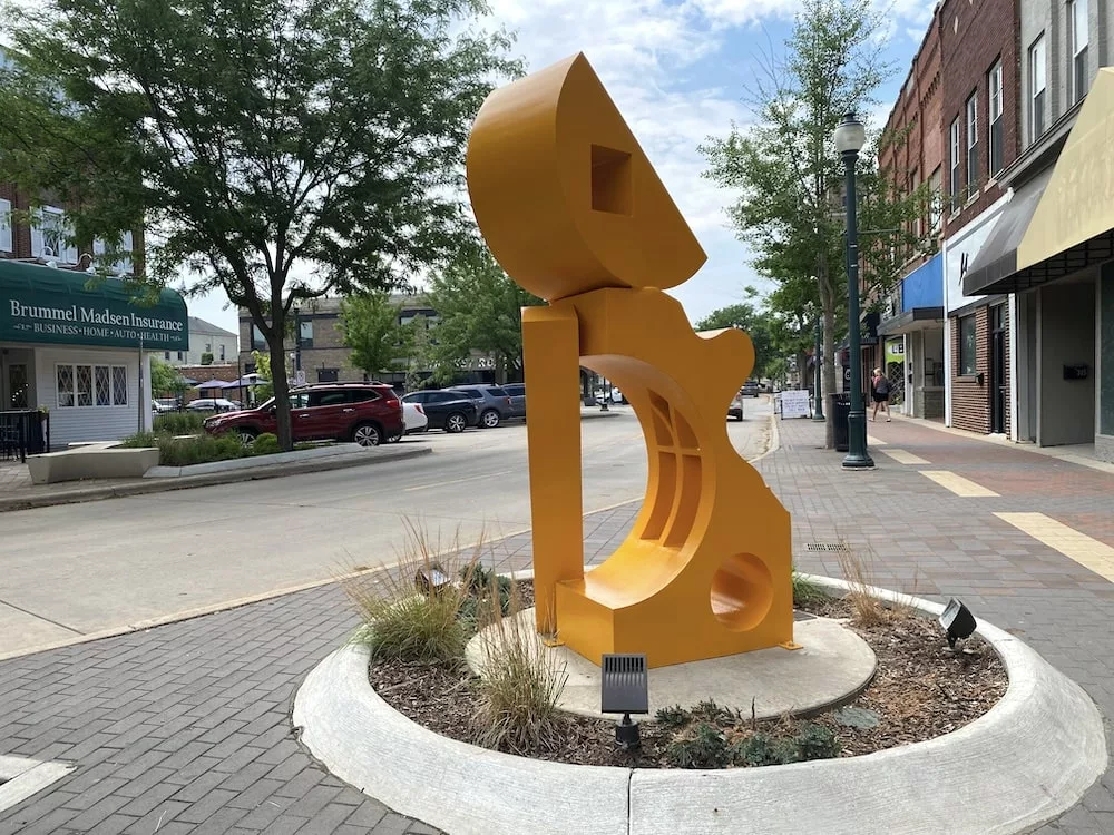 Yellow sculpture in downtown Cedar Falls, Iowa