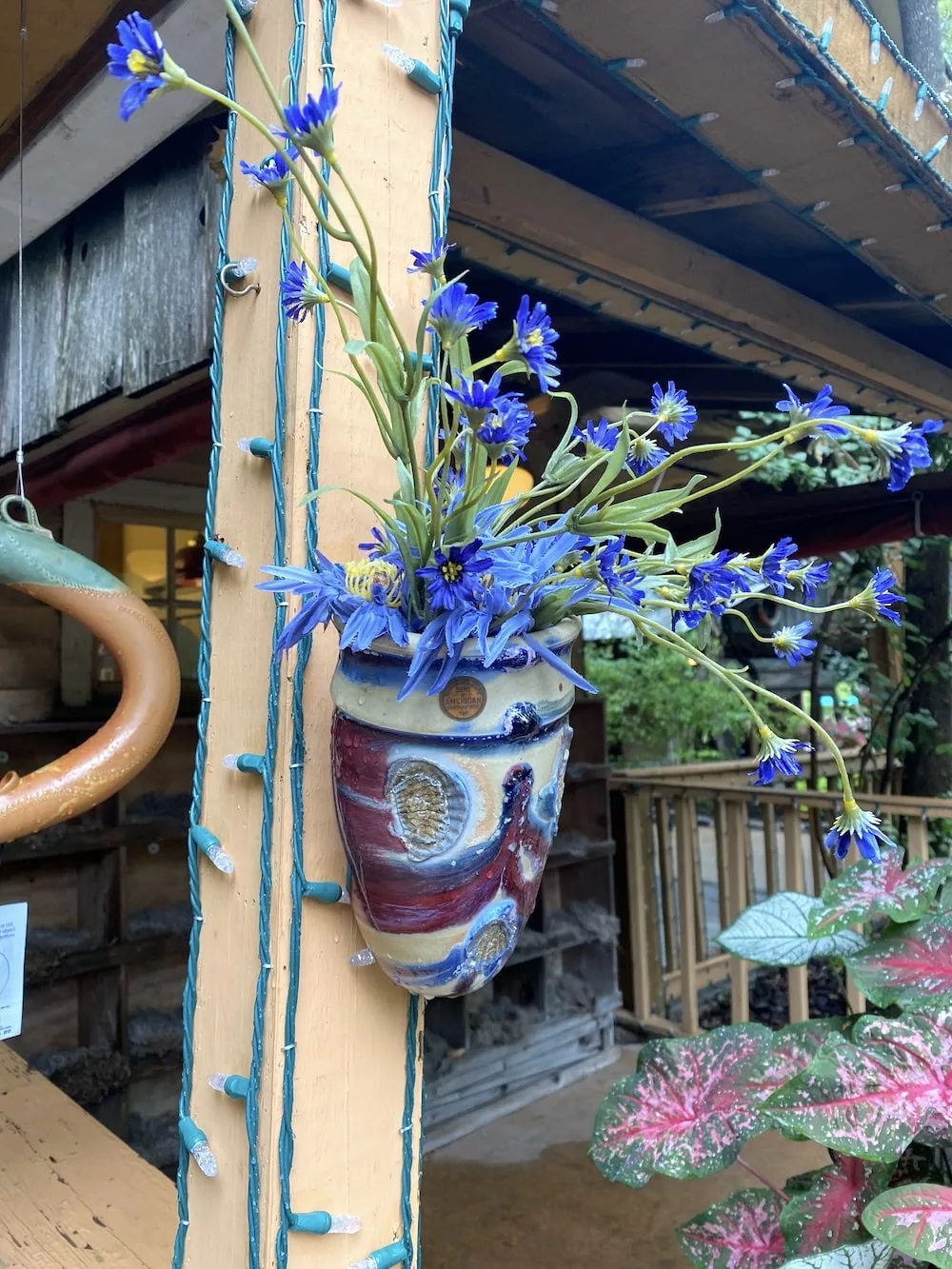 Handmade pottery filled with flowers at Silver Dollar City in Branson, Missouri